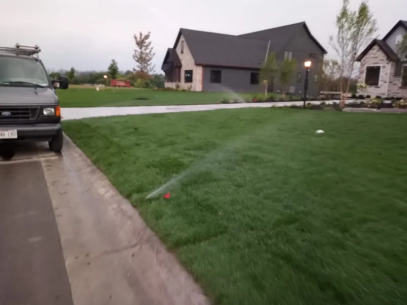 Perea Lawn Sprinkler van at a new home sprinkler installation